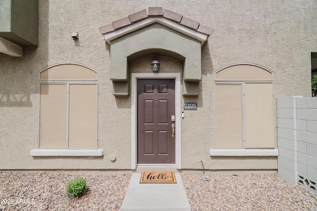 2402 E 5th St Unit 1498, Tempe, AZ 85288 - view of exterior entry with stucco siding