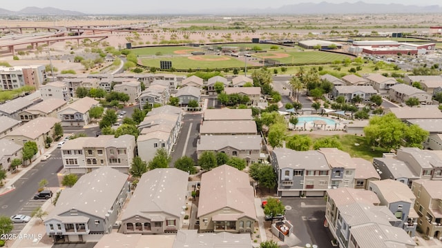 2402 E 5th St Unit 1498, Tempe, AZ 85288 - aerial view of property and surrounding area featuring nearby suburban area, mountains, and a pool area