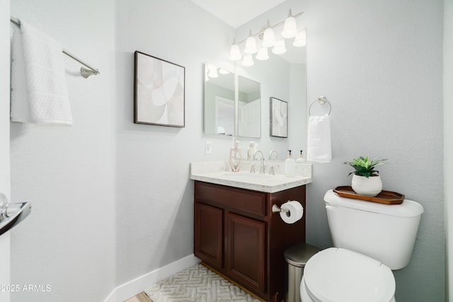2402 E 5th St Unit 1498, Tempe, AZ 85288 - bathroom with vanity, toilet, and baseboards