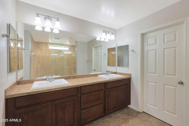 bathroom featuring vanity and a tile shower