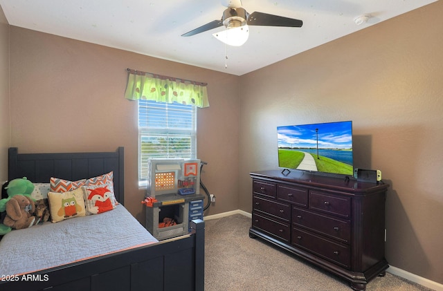 carpeted bedroom with ceiling fan