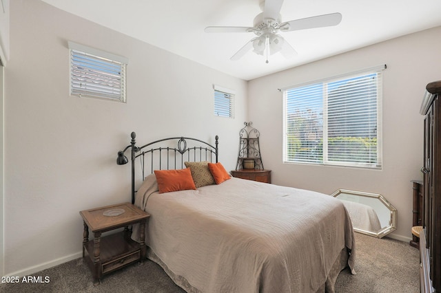 bedroom with ceiling fan and carpet floors