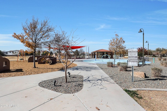 view of community with a playground and a gazebo