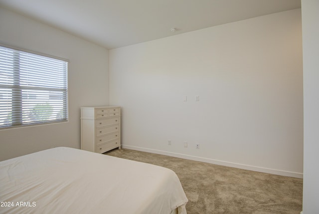 2228 E Isaiah Ave, Gilbert, AZ 85298 - bedroom with light carpet and baseboards
