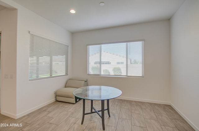 living area with light hardwood / wood-style floors