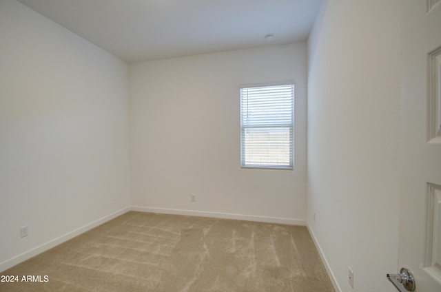 2228 E Isaiah Ave, Gilbert, AZ 85298 - unfurnished room featuring light carpet and baseboards