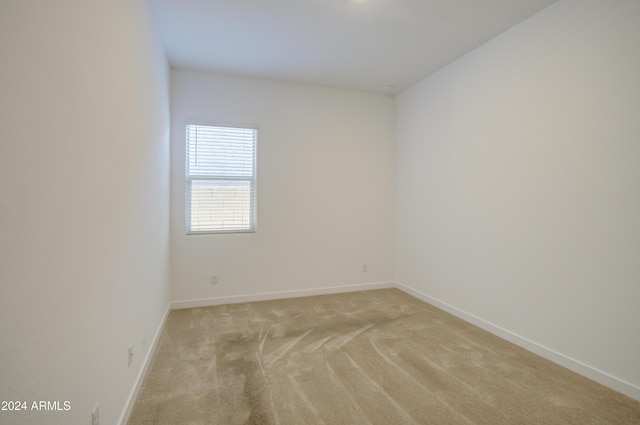 2228 E Isaiah Ave, Gilbert, AZ 85298 - spare room with light colored carpet and baseboards