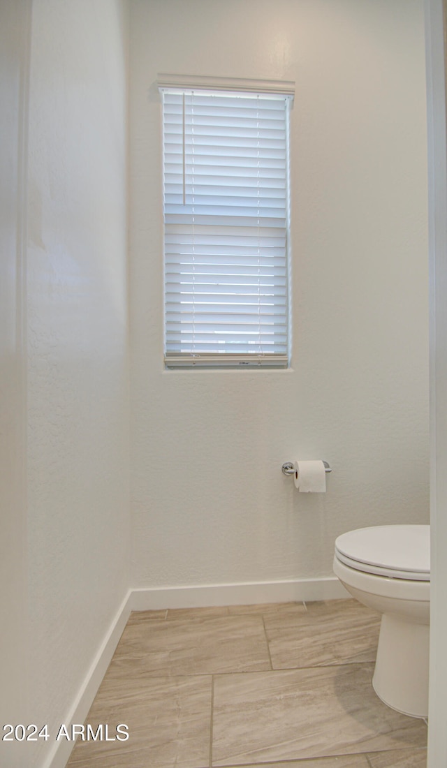 bathroom featuring toilet