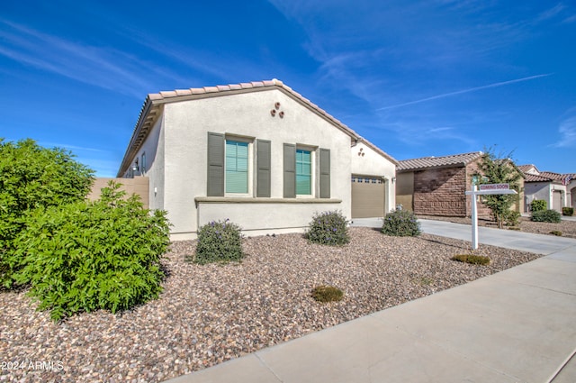 view of front of home featuring a garage