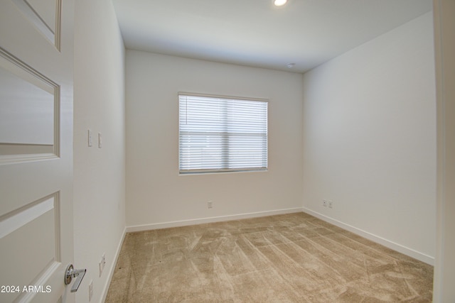 2228 E Isaiah Ave, Gilbert, AZ 85298 - unfurnished room with light carpet, baseboards, and recessed lighting