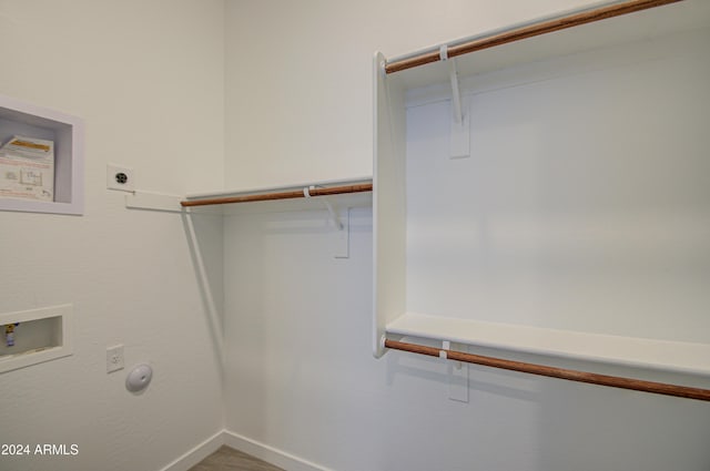 2228 E Isaiah Ave, Gilbert, AZ 85298 - washroom with hookup for an electric dryer, hookup for a gas dryer, hookup for a washing machine, baseboards, and wood finished floors