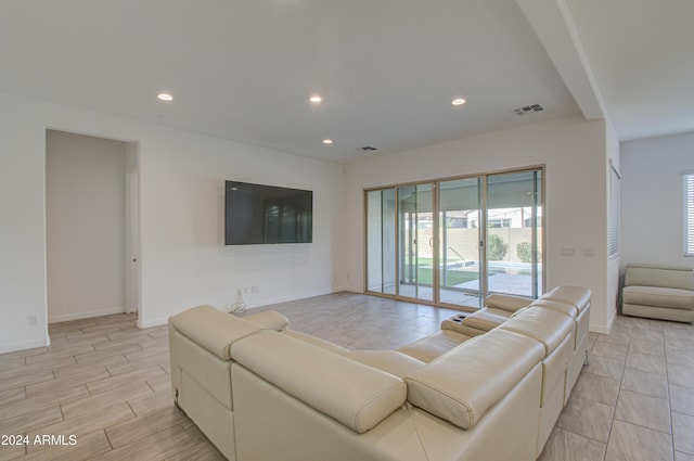 2228 E Isaiah Ave, Gilbert, AZ 85298 - living area featuring plenty of natural light, baseboards, recessed lighting, and light wood finished floors