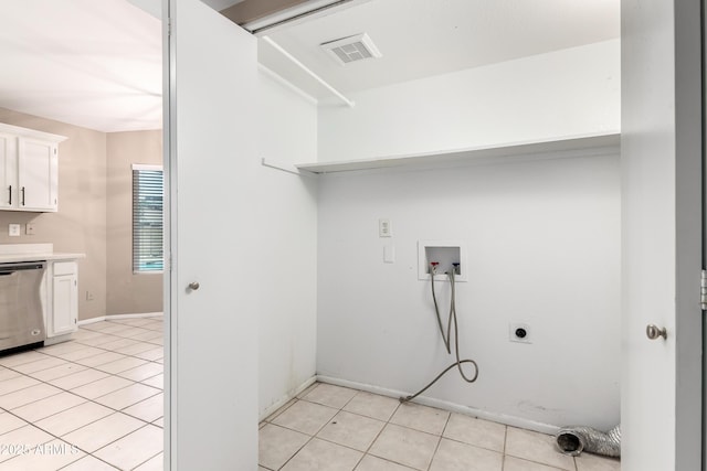 washroom featuring light tile patterned floors, visible vents, hookup for an electric dryer, and hookup for a washing machine