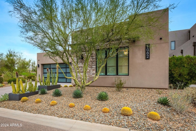 view of adobe home