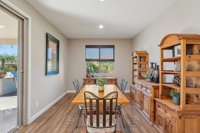 30342 N 130th Dr, Peoria, AZ 85383 - dining space featuring baseboards, wood finished floors, and recessed lighting