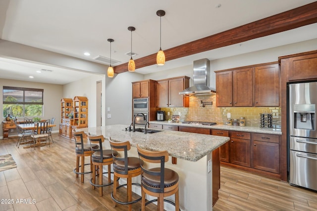30342 N 130th Dr, Peoria, AZ 85383 - kitchen featuring wall chimney range hood, backsplash, a sink, and stainless steel appliances