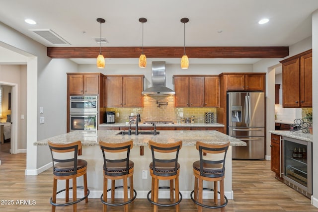 30342 N 130th Dr, Peoria, AZ 85383 - kitchen with a sink, wall chimney exhaust hood, beverage cooler, stainless steel appliances, and beamed ceiling