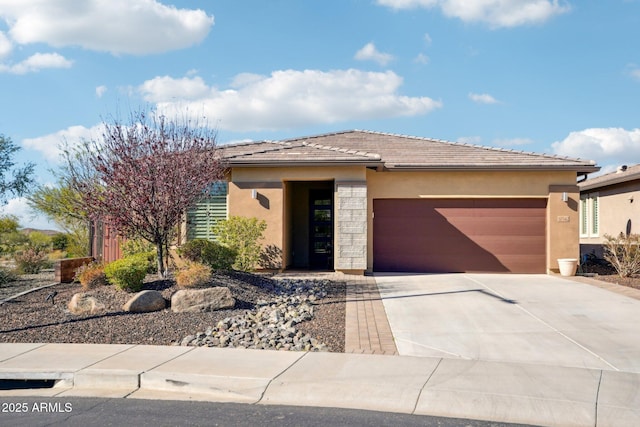30342 N 130th Dr, Peoria, AZ 85383 - prairie-style home with a tile roof, a garage, driveway, and stucco siding
