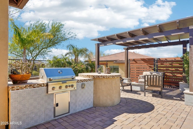 30342 N 130th Dr, Peoria, AZ 85383 - view of patio with exterior kitchen, area for grilling, a pergola, and fence