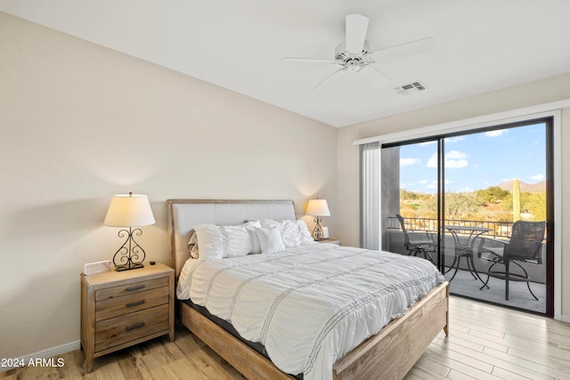 bedroom with access to exterior, light hardwood / wood-style floors, and ceiling fan