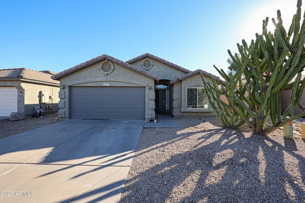 view of front of home with a garage