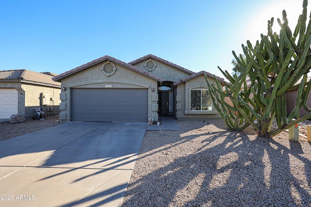 view of front of home with a garage