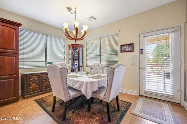 2726 S 160th Ave, Goodyear, AZ 85338 - dining room with a chandelier and light tile patterned floors