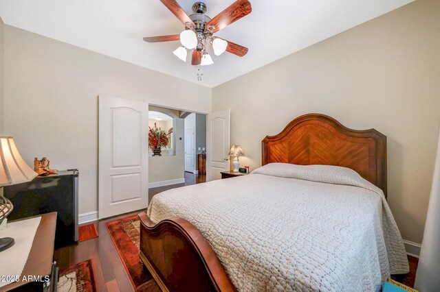 2726 S 160th Ave, Goodyear, AZ 85338 - bedroom with dark wood-type flooring, baseboards, and ceiling fan