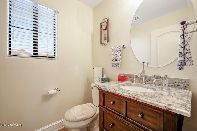 2726 S 160th Ave, Goodyear, AZ 85338 - bathroom featuring vanity, toilet, and baseboards