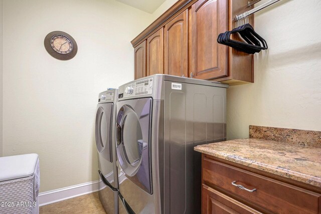 2726 S 160th Ave, Goodyear, AZ 85338 - laundry room featuring cabinet space, separate washer and dryer, and baseboards