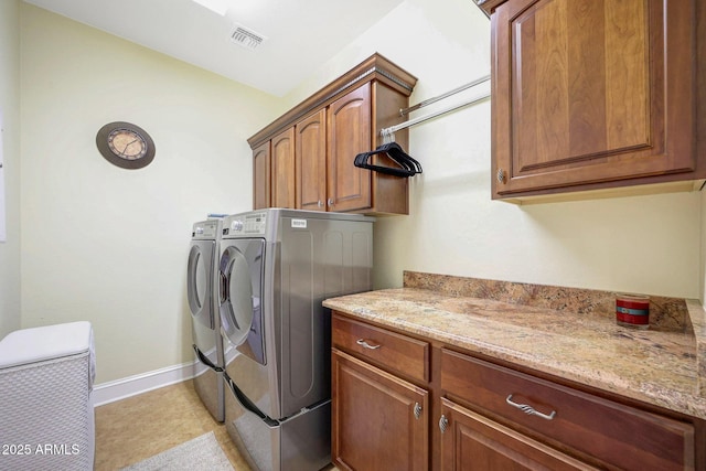 2726 S 160th Ave, Goodyear, AZ 85338 - laundry area with washing machine and clothes dryer, cabinet space, and baseboards