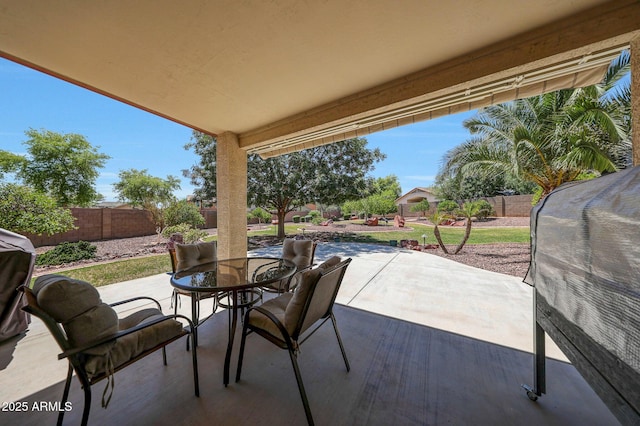 2726 S 160th Ave, Goodyear, AZ 85338 - view of patio featuring a fenced backyard and outdoor dining space