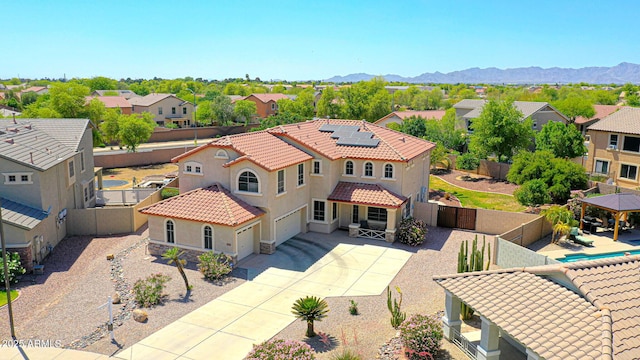 2726 S 160th Ave, Goodyear, AZ 85338 - aerial perspective of suburban area featuring a mountainous background