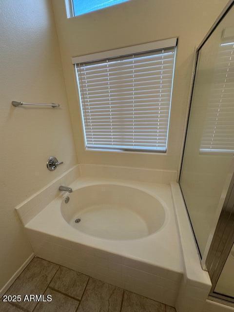 20275 N 81st Ln, Peoria, AZ 85382 - bathroom featuring a bath and tile patterned floors