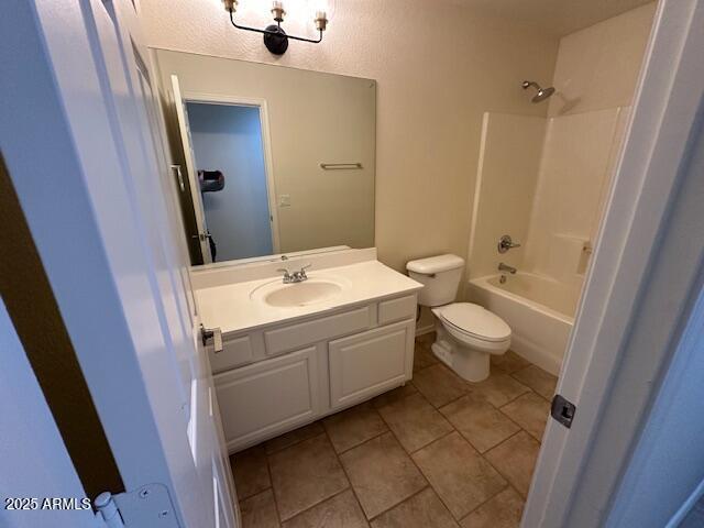 20275 N 81st Ln, Peoria, AZ 85382 - full bath with toilet, vanity,  shower combination, and tile patterned floors