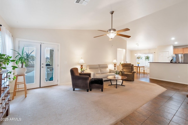 23677 N Desert Dr, Florence, AZ 85132 - living area featuring vaulted ceiling, french doors, ceiling fan, recessed lighting, and a chandelier