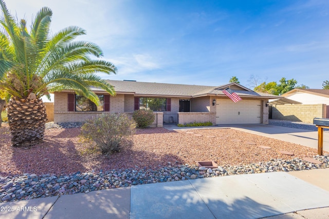 ranch-style home featuring a garage