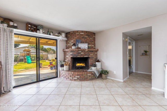 unfurnished living room featuring light tile patterned floors and a fireplace