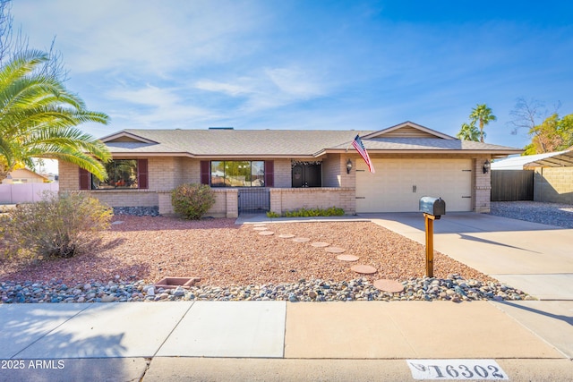 ranch-style house featuring a garage