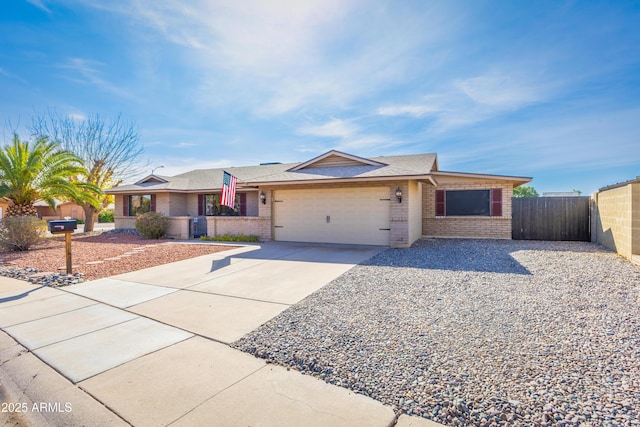 ranch-style house featuring a garage