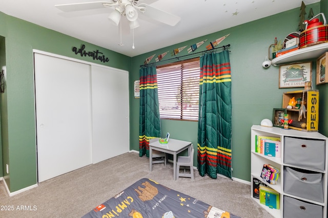 game room featuring ceiling fan and carpet flooring