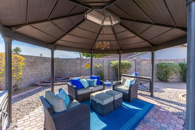 view of patio with a gazebo and outdoor lounge area