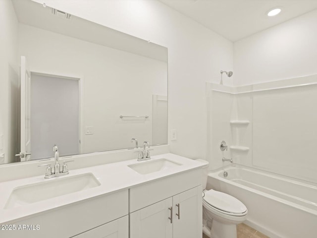 full bathroom featuring vanity, toilet, and shower / bath combination