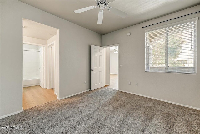 29606 N Tatum Blvd N Unit 265, Cave Creek, AZ 85331 - unfurnished bedroom with carpet floors and ceiling fan