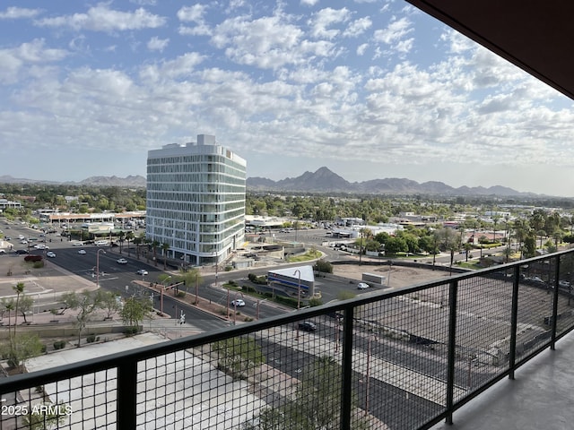 balcony featuring a mountain view
