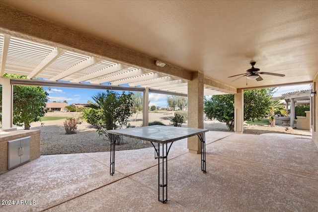 view of patio featuring a pergola and ceiling fan