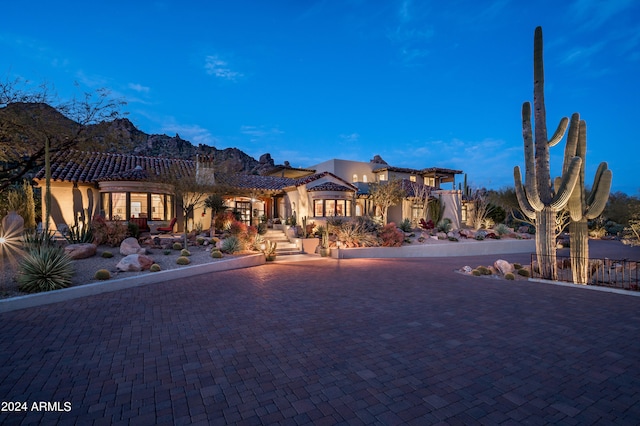 view of front of house with a mountain view