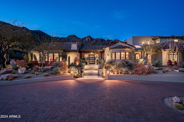 view of front of house with a mountain view