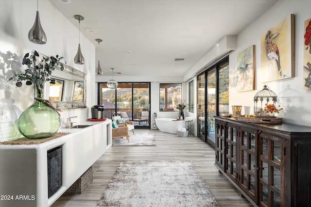 interior space featuring sink and beverage cooler