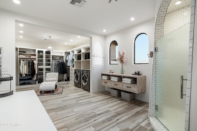 interior space with washing machine and dryer